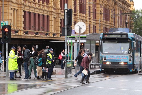Again, oblivious to traffic because of their mobile phone, and about to get booked for jaywalking