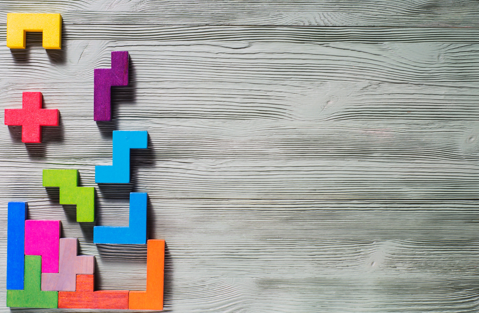 Geometric shapes on a wooden background