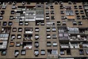 Windows face out of the building, known as the “TV building”, on Block 28