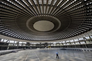 A security worker walks inside Hall 1 of the Belgrade Fair in Belgrade